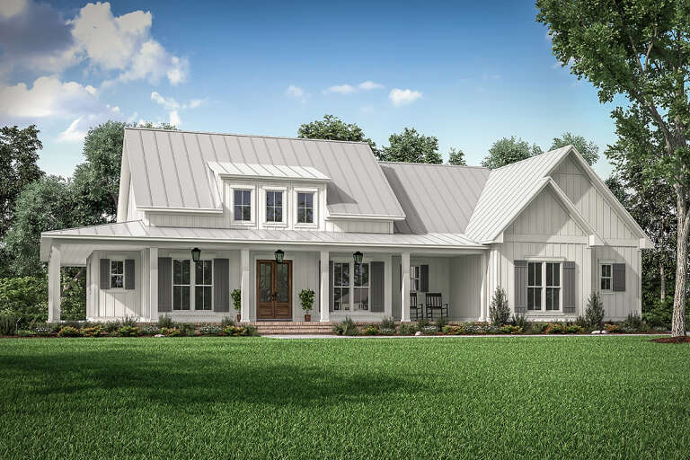 A white modern farmhouse with a wrap around porch