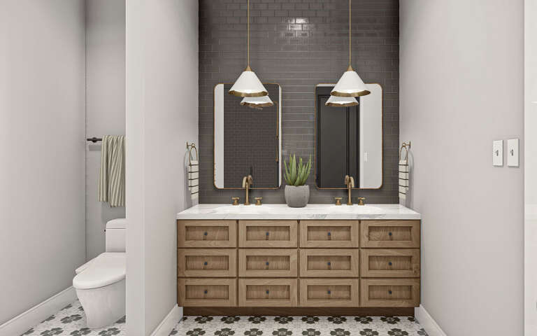 A Modern rustic home design’s luxurious bathroom with double vanity and granite countertop.