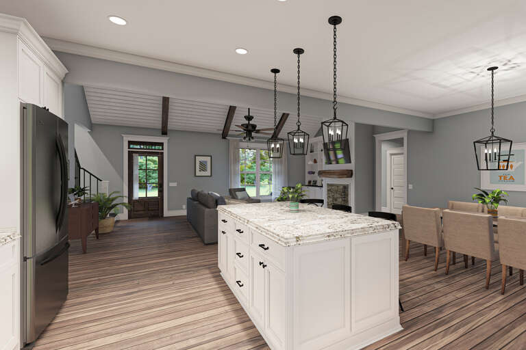 3 bedroom open floor plan living area in a Modern farmhouse style home with a large kitchen island.