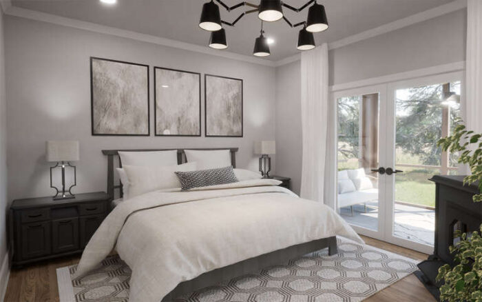 The Primary bedroom of a 3-bedroom Modern Farmhouse furnished in neutral tones with wood & metal accents.