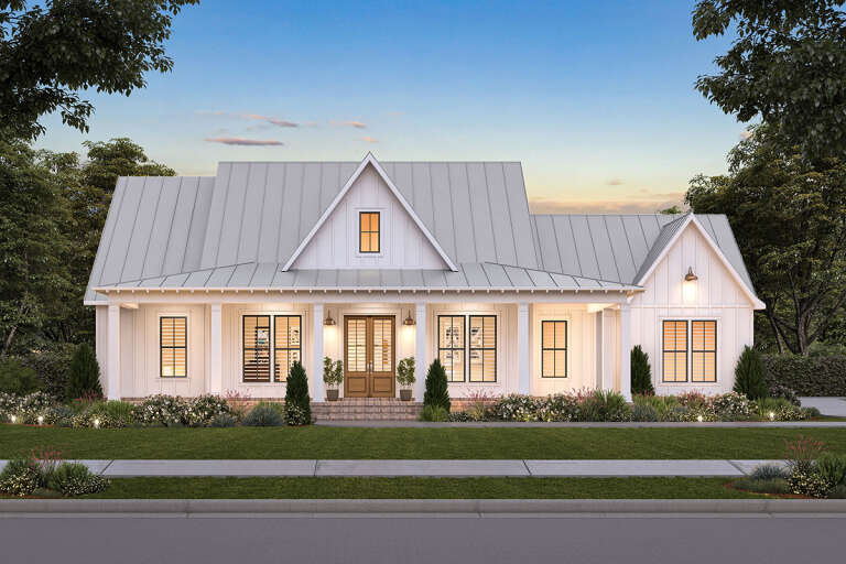 A white Modern farmhouse 3-Bedroom floor plan home surrounded by a lush garden.
