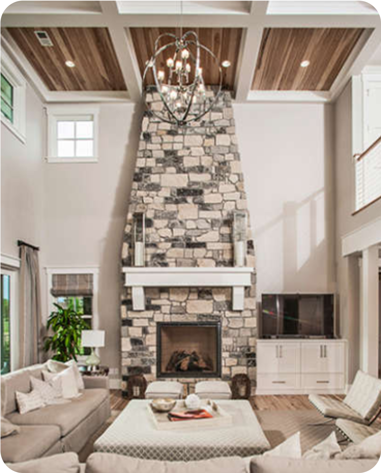 Living Room with Tall Stone Fireplace