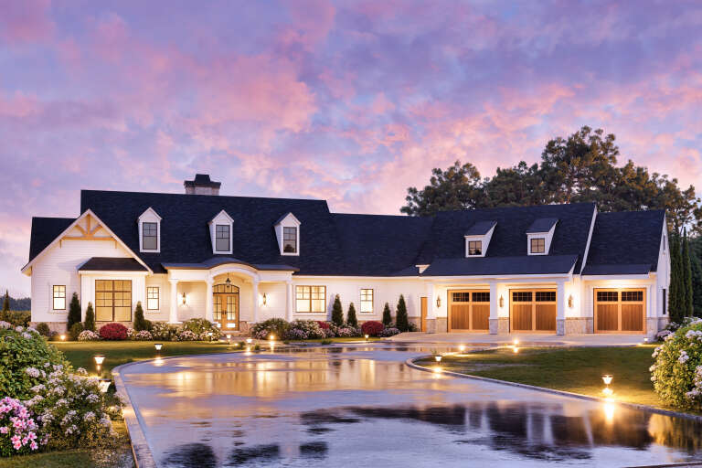 House Plan House Plan #18830 Angled Front Elevation at Dusk