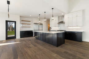 Modern Transitional House Plan #2464-00098 Build Photo