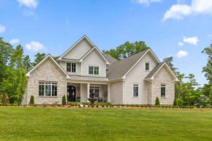 Traditional House Plan #7568-00008 Build Photo