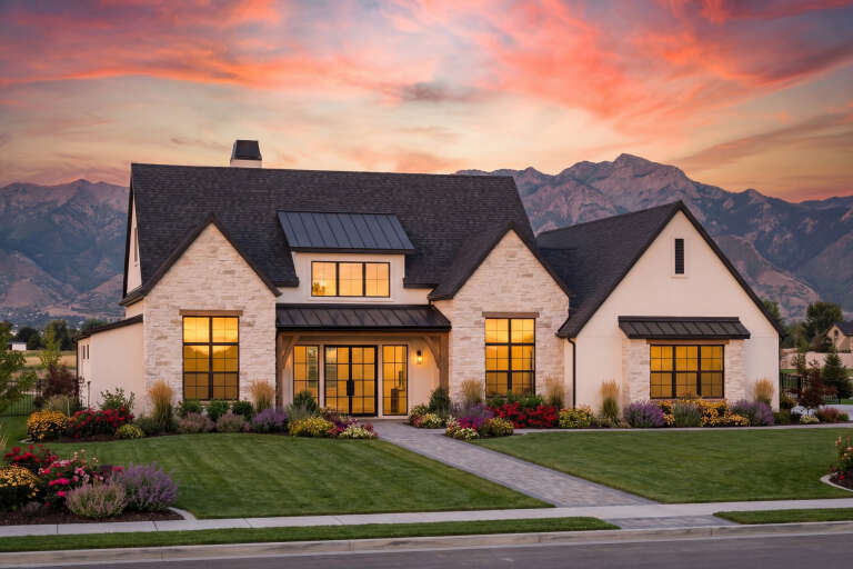 House Plan House Plan #30666 Angled Front Elevation at Dusk