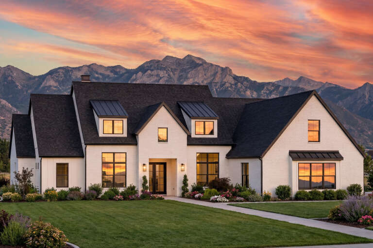 House Plan House Plan #30679 Angled Front Elevation at Dusk