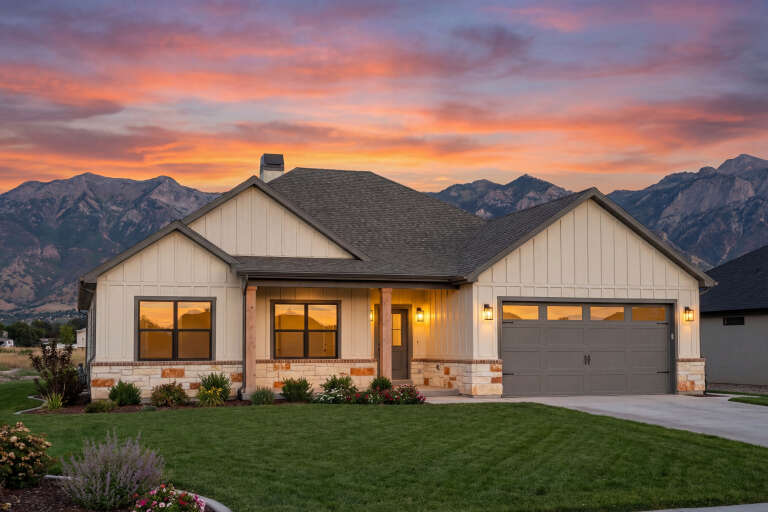 House Plan House Plan #30934 Angled Front Elevation at Dusk