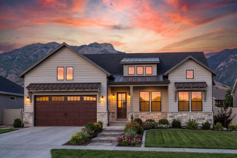 House Plan House Plan #30954 Angled Front Elevation at Dusk