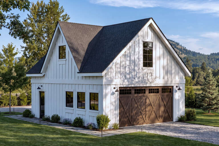 Angled front view of a white house in Modern Farmhouse style, board-and-batten siding, wood garage door, dark roof. House Plan # 5387-00007