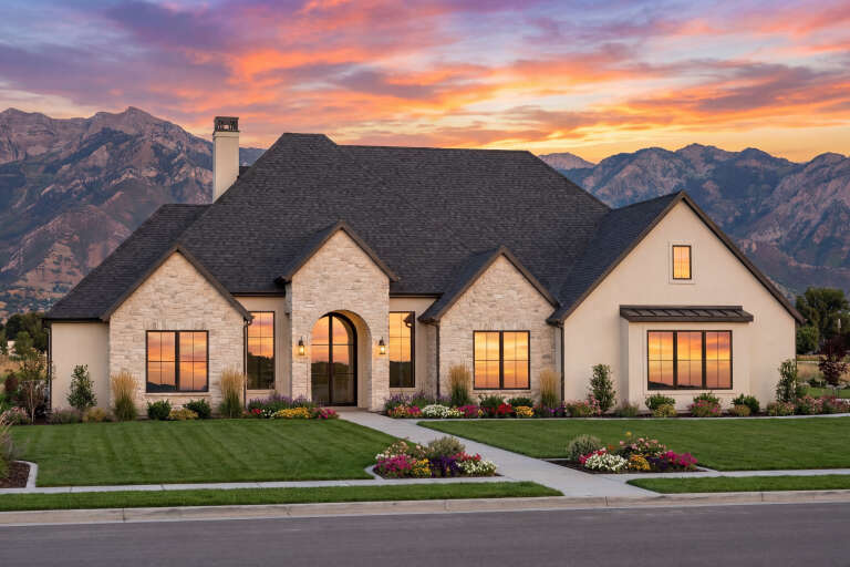 House Plan House Plan #33071 Angled Front Elevation at Dusk