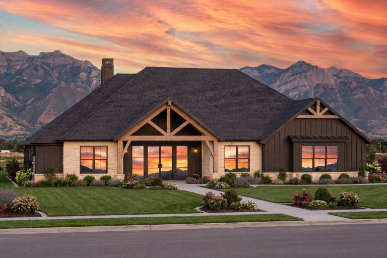 House Plan House Plan #33085 Angled Front Elevation at Dusk