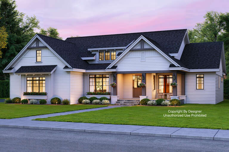House Plan House Plan #33171 Angled Front Elevation at Dusk