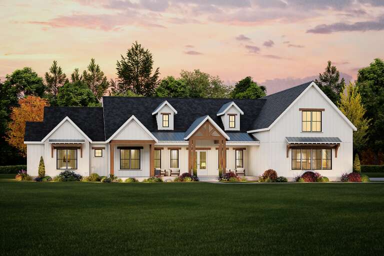 House Plan House Plan #34014 Angled Front Elevation at Dusk