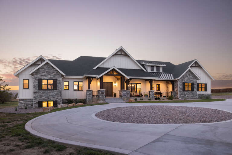 House Plan House Plan #34352 Angled Front Elevation at Dusk