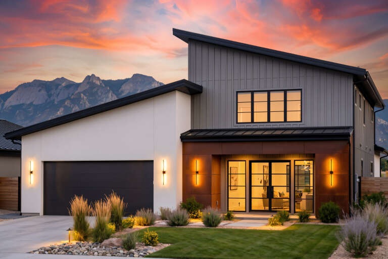 House Plan House Plan #34996 Angled Front Elevation at Dusk