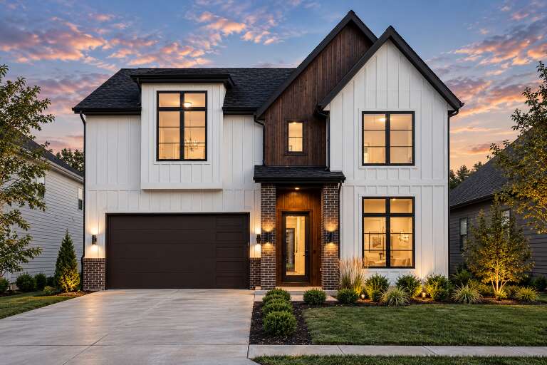 White Modern Transitional, Front Elevation at dusk, board-and-batten siding, brick accents, lit windows, and landscaping. House Plan # 9185-00039 Digital Rendering by America's Best House Plans, Inc.