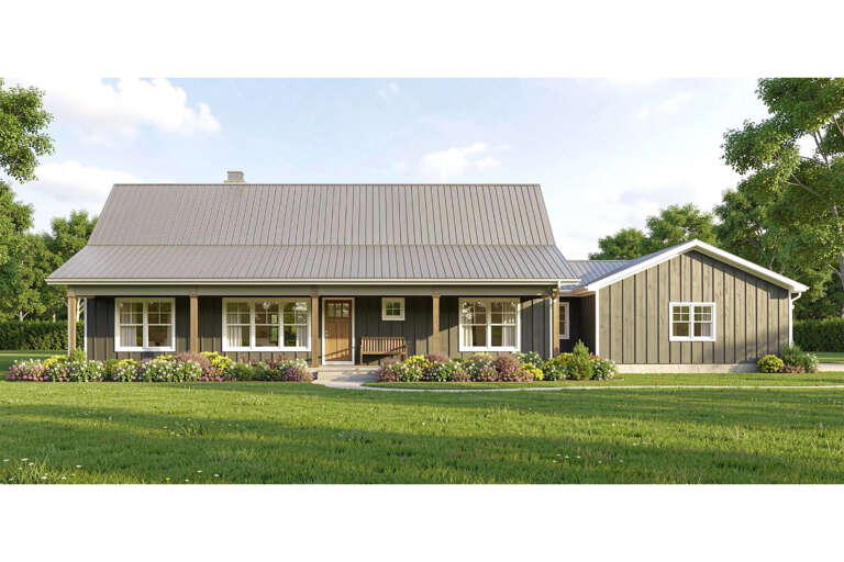 Front view of a grey house in Modern Farmhouse style, metal roof, wood porch posts, and vibrant garden landscaping. House Plan # 3125-00040
