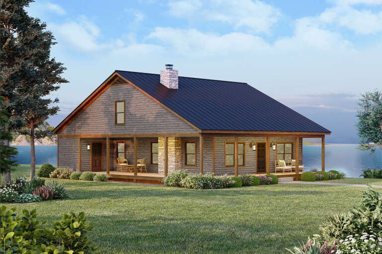 Grey Cabin, Angled Front Elevation, wood siding, metal roof, stone chimney, wrap-around porch, and lush landscaping. House Plan # 940-01461 Digital Rendering by America's Best House Plans, Inc.
