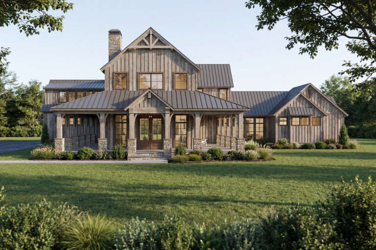 Grey Modern Farmhouse, Front Elevation, vertical wood siding, stone base, metal roof, covered porch, lush landscaping. House Plan # 8318-00495 Digital Rendering by America's Best House Plans, Inc.