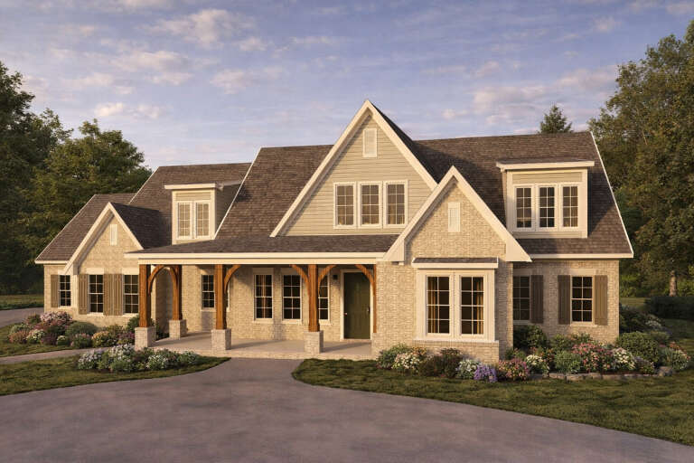 Beige European, Angled Front Elevation, stone siding, timber porch brackets, green door, shutters, and lush landscaping. House Plan # 1070-00373 Digital Rendering by America's Best House Plans, Inc.