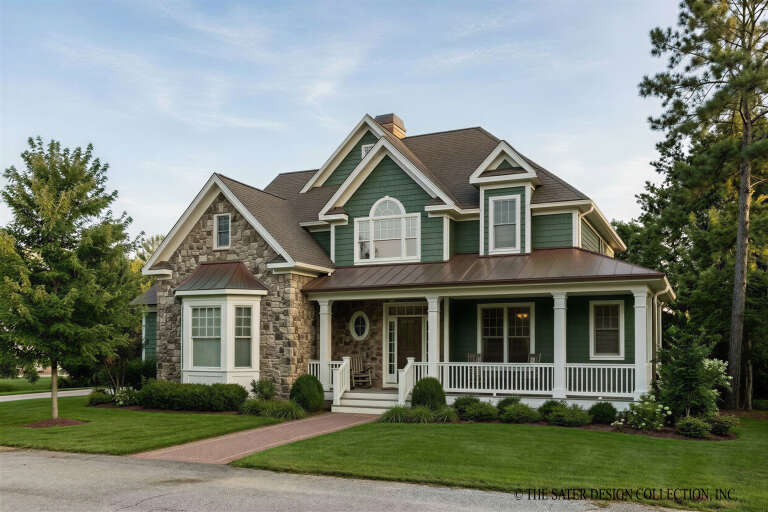 Green Craftsman, Angled Front Elevation, stone siding, metal roof, white porch railings, brick path, lush landscaping. House Plan # 8436-00159 Digital Rendering by America's Best House Plans, Inc.
