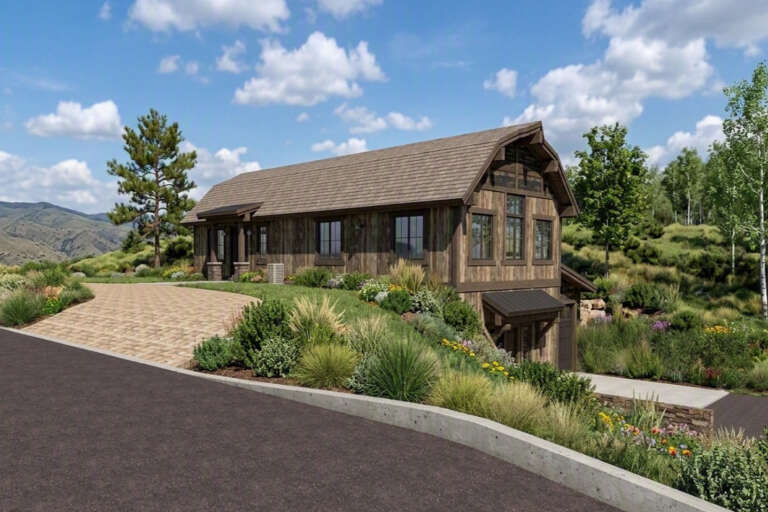 Brown Barndominium, Angled Front Elevation with rustic wood siding, stone accents, paver driveway, and lush landscaping. House Plan # 425-00074 Digital Rendering by America's Best House Plans, Inc.