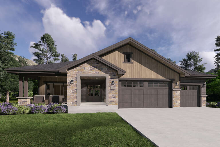 Tan Craftsman, Angled Front Elevation, stone veneer, vertical siding, dark garage doors, porch lighting, lavender bushes. House Plan # 425-00075 Digital Rendering by America's Best House Plans, Inc.