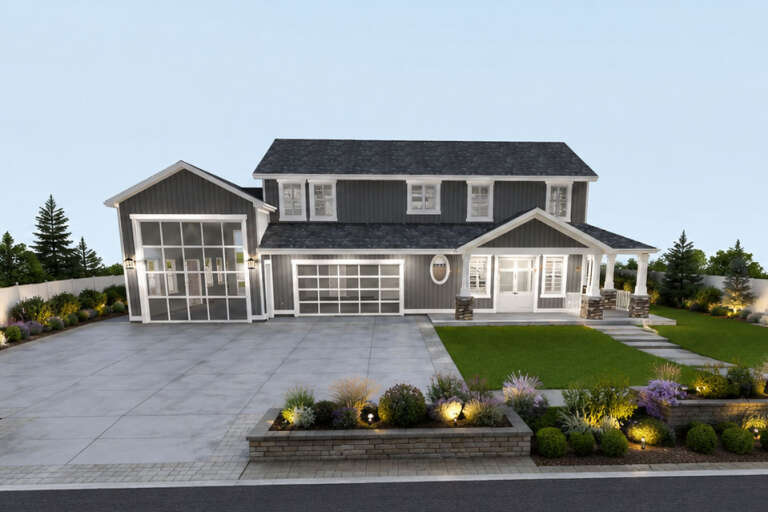 Grey Barndominium, Front Elevation, vertical siding, glass garage doors, stone porch columns, lit landscaping, driveway. House Plan # 2802-00571 Digital Rendering by America's Best House Plans, Inc.