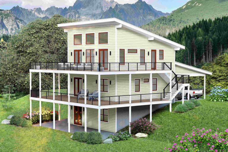 Pale green Contemporary, Angled Left Elevation, lap siding, tiered decks, cable railings, mountain backdrop, lush lawn. House Plan # 940-01471 Digital Rendering by America's Best House Plans, Inc.