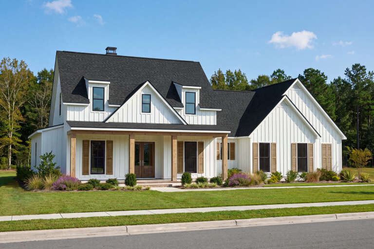 White Modern Farmhouse, Angled Front Elevation, board-and-batten siding, wood porch posts, shutters, and landscaping. House Plan # 2473-00015 Digital Rendering by America's Best House Plans, Inc.