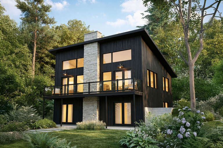 Black Contemporary, Angled Rear Elevation, vertical siding, stone chimney, glass balcony, lit windows, lush landscaping. House Plan # 034-01448 Digital Rendering by America's Best House Plans, Inc.