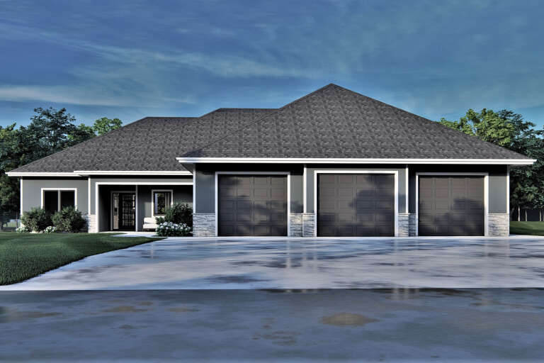 Grey Barndominium, Front Elevation, stone base, three dark garage doors, concrete driveway, and lush green landscaping. House Plan # 7140-00023 Digital Rendering by America's Best House Plans, Inc.