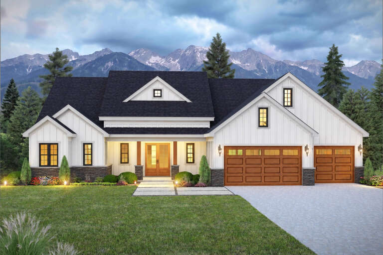 Front view of a white house in Modern Farmhouse style, board-and-batten siding, stone base, wood garage, gabled roof. House Plan # 940-01477