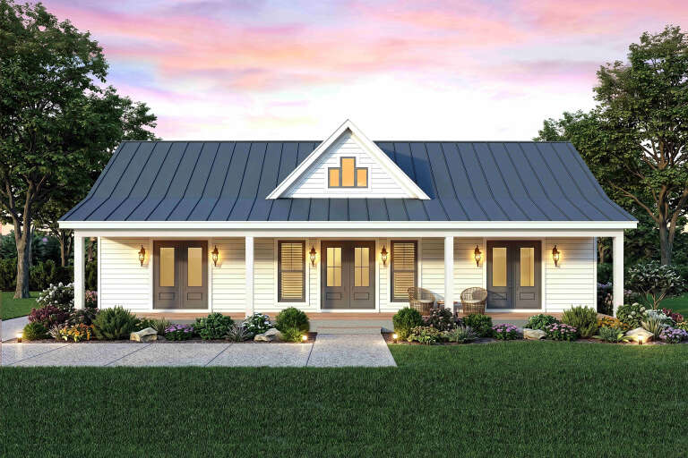 White Modern Farmhouse, Front Elevation, metal roof, horizontal siding, lit lanterns, porch seating, lush landscaping. House Plan # 940-01480 Digital Rendering by America's Best House Plans, Inc.