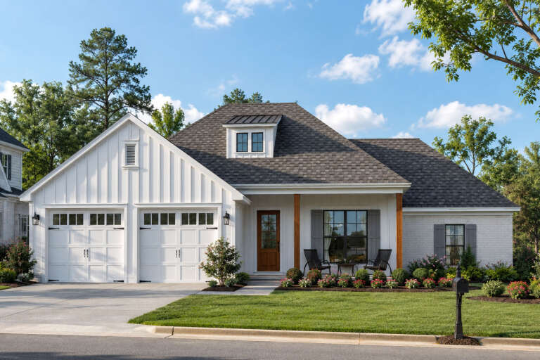 Front view of a white house in Modern Farmhouse style, board-and-batten siding, brick accents, and a covered porch. House Plan # 9035-00264