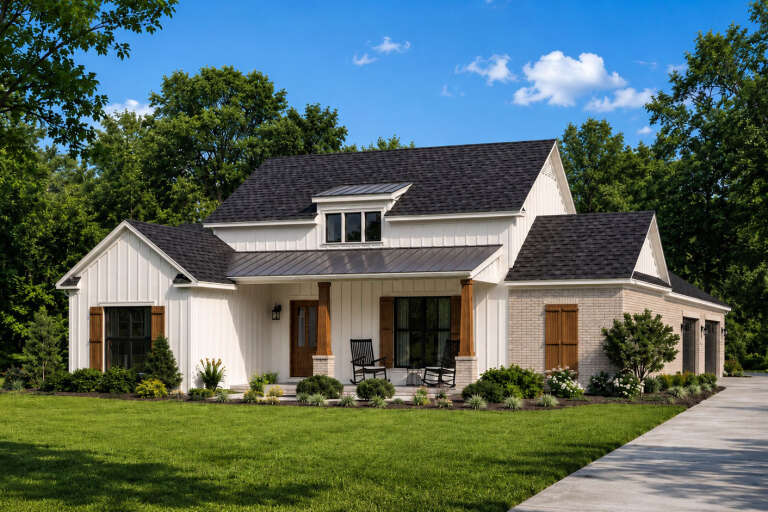 Angled front view of a white house in Modern Farmhouse style, board-and-batten siding, brick accents, and metal roof porch. House Plan # 9035-00265