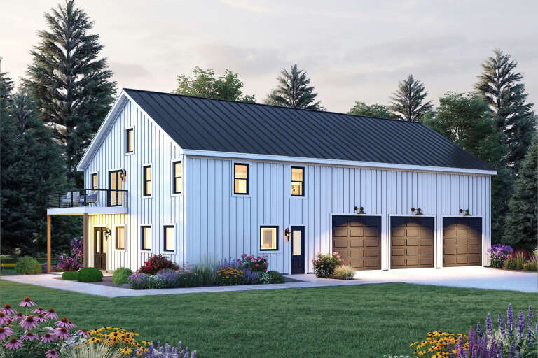 Angled front view of a white house in Barndominium style, black metal roof, three garage bays, and upper-level balcony. House Plan # 940-01488
