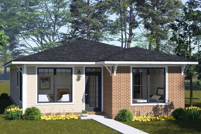 Front view of a tan and brick Contemporary house, hipped roof, black windows, and decorative brackets. House Plan # 4848-00658