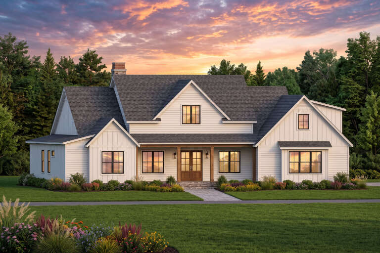 Front view of a white house in Modern Farmhouse style, gabled roof, black windows, wood entry, and lush landscaping. House Plan # 7983-00216